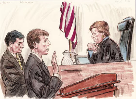 Will Heaton, center, standing with attorney John Nassikas, left, enters his plea before U.S. District Judge Ellen Huvelle.